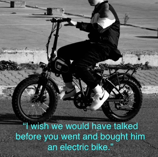 "I wish we would have talked before you went and bought him an electric bike." — person riding electric bike